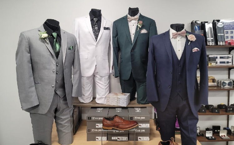 Examples of different tuxedo styles and colors available as part of a prom tux rental package at J Robert's Menswear