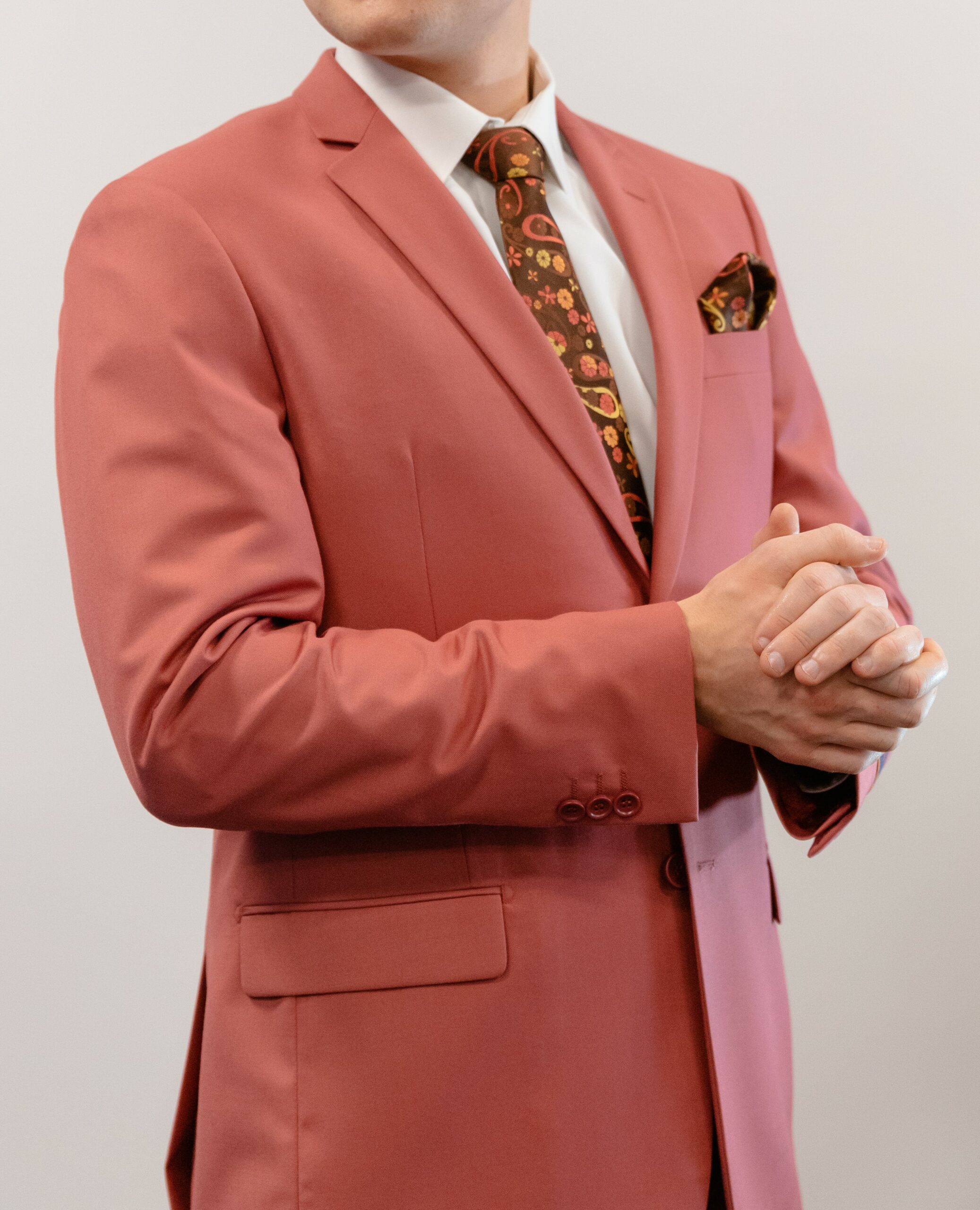 Salmon-mens-suit-for-prom-weddings-formal-events-J-Roberts-Menswear-Janesville